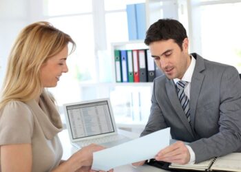 woman meeting banker to set up her own business