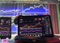 Stock Market chart on laptop and mobile