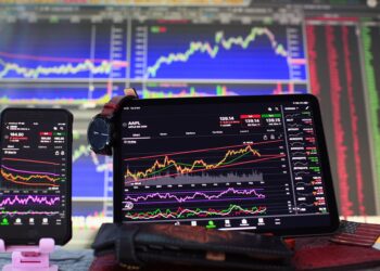 Stock Market chart on laptop and mobile