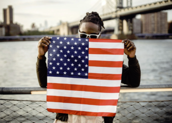 Man holding US flag