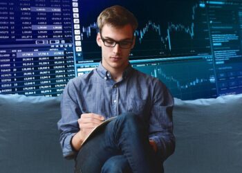 Man using his tablet to trade