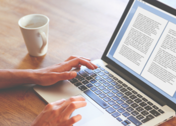 Writer writing on laptop