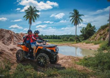 ATV near lake | FintechZoom