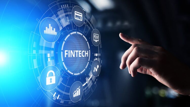 Person with hand over a digital fintech image | FintechZoom