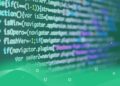 Green Code on Computer Screen | FintechZoom