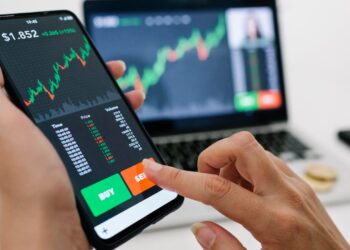 Person using Crypto APP | FintechZoom