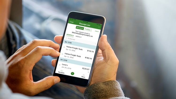 Person using mobile app to check digital receipts | FintechZoom