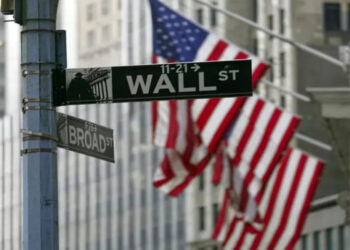 Wall Street in US Flag at background | FintechZoom