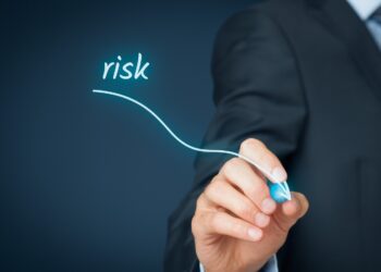 Man Drawing a risk chart | FintechZoom