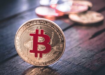 Bitcoin with red symbol | FintechZoom