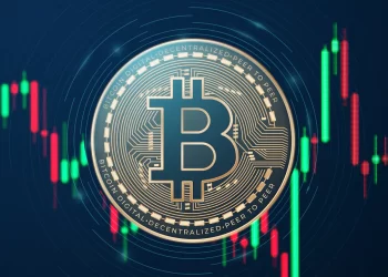 Bitcoin over candlestick chart background | FintechZoom
