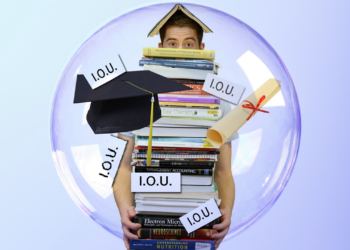 Student on bubble hanging several books | FintechZoom