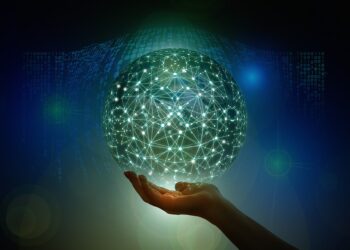 Person holding a digital world | FintechZoom