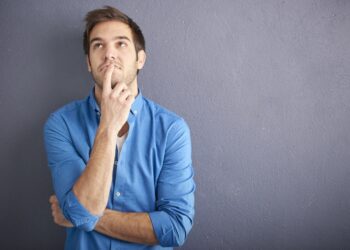 Person thinking in investments | Fintechzoom