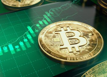 Golden Bitcoin over a Green candlestick chart | FintechZoom