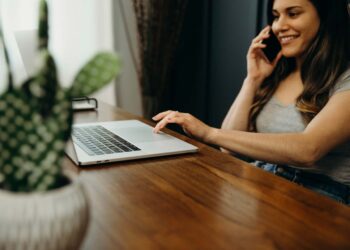 Woman waiting for mortgage ~ FintechZoom