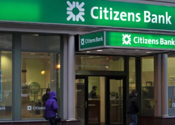 Pedestrians walk past a Citizens Bank location in downtown Boston, Massachusetts, U.S. | FintechZoom