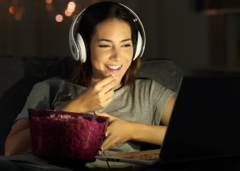 Watching movies on laptop | FintechZoom