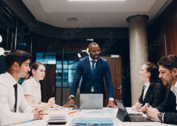 Business man on meeting | FintechZoom