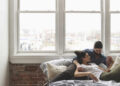 Couple resting in fresh home | FintechZoom