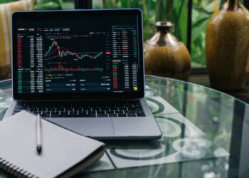 Stock Chart Displayed on a Laptop | FintechZoom