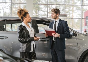 A Woman Buying a Car | FintechZoom