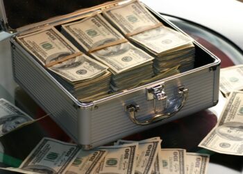 Hard Cash on a Briefcase | FintechZoom