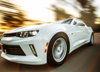 Close-Up Photography of White Chevrolet Camaro | FintechZoom