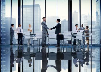 Handshake business meeting | FintechZoom