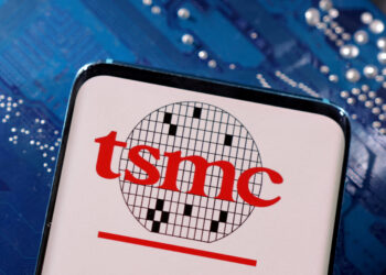 A smartphone with a displayed TSMC | FintechZoom