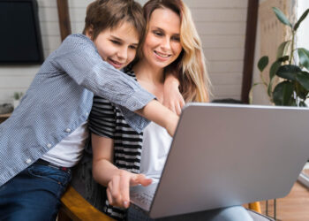 Happy Young boy with his mom | FintechZoom