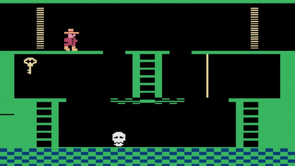 Screenshot of an Atari 2600 game console displaying a character wearing a hat on a platform, with ladders, a key, and a rope. Below is a skull-like enemy and a blue-green checkered floor. The game graphics are pixelated and simplistic. | FintechZoom