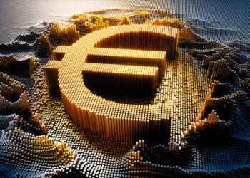 A large, golden Euro symbol composed of small 3D rectangular blocks stands prominently against a background of scattered, irregularly-sized blocks, illuminated by a bright, warm light and casting shadows, creating a textured digital landscape that embodies the dynamic world of Fintech News. | FintechZoom