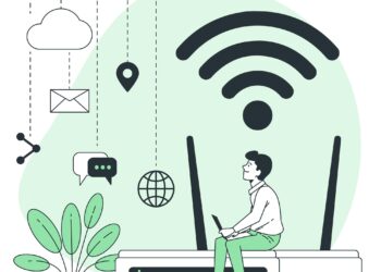 Illustration of a person sitting on a large WiFi router, using a laptop. Various icons around them include a cloud, email, chat bubble, world globe, location pin, share symbol, and a large WiFi signal. A potted plant is placed on the left side of the router. An IP address is displayed prominently near the laptop screen. | FintechZoom