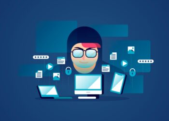 Illustration of a hacker wearing a hoodie and glasses against a blue background. The hacker is surrounded by digital devices like a laptop, desktop, tablet, and smartphone. Various icons, including padlocks, images, and passwords, signify identity theft and other cybersecurity threats. | FintechZoom