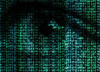 A digital illustration comprised of rows of blue and green alphanumeric characters on a black background. The characters form the abstract outline of a human eye and face, creating a visual effect reminiscent of computer code and data imagery, evoking the cyber aesthetic popularized by Trendzguruji.me Cyber. | FintechZoom