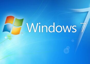 The image shows the Windows 7 operating system logo with the text "Windows 7" to the right of the Windows logo. The background is blue with light streaks, circles, and a small plant design on the left side, subtly hinting at Error Code 0x0 Windows 7 in its visual narrative. | FintechZoom