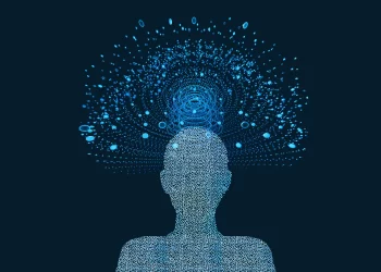 Silhouette of a person made from light blue dots with a digital data burst emerging from the head, represented by binary code and abstract patterns in bright blue on a dark background. The design suggests a theme of information, technology, or artificial intelligence. Explore more at Vstechpanel.com. | FintechZoom