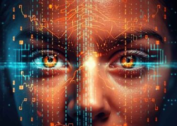 A close-up digital illustration of a human face with intense, glowing eyes. The face is overlaid with blue and orange circuit patterns, giving a futuristic high-tech appearance, and suggesting the integration of technology and biometrics with human features. | FintechZoom