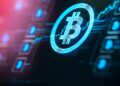 A glowing Bitcoin symbol is displayed prominently in the center of a dark, digital-themed background with circuit-like patterns and blue accents, symbolizing cryptocurrency and digital assets within blockchain technology. | FintechZoom