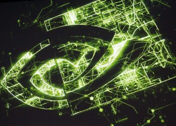 A glowing green Nvidia logo is surrounded by intense green and yellowish electrical lines and sparks on a dark background, symbolizing its futuristic high-tech appearance and reflecting the immense Nvidia revenue growth. | FintechZoom