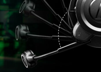 Close-up of a sleek, black headphone with a flexible microphone. The image shows the microphone in multiple positions, demonstrating its adjustability. A dashed arc highlights the range of motion, and a green tech background adds a modern feel—one of the best gaming headsets available. | FintechZoom
