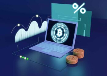 A laptop displays a glowing Bitcoin symbol on its screen. Surrounding the laptop are digital graphs, coins stacked in the foreground, and a percentage symbol. The background has a futuristic digital theme with blue and green tones, hinting at the best crypto exchange platforms dominating the market. | FintechZoom