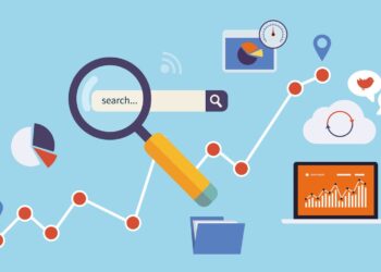 Illustration of digital marketing concepts. A magnifying glass hovers over a search bar, showcasing SEO foundation. Various charts and graphs indicate data analysis, gears symbolize settings, location icons, a cloud, and a laptop displaying analytics. Background is light blue. | FintechZoom