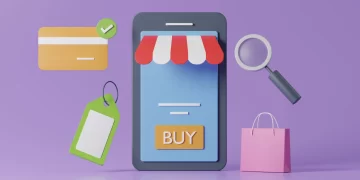 A minimalist illustration of eCommerce features a smartphone with a striped awning displaying a "BUY" button. Nearby are icons of a credit card, price tag, magnifying glass, and shopping bag, all set against a purple background. | FintechZoom