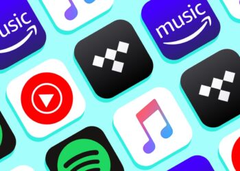 A grid of music streaming service app icons against a light blue background. The icons include logos for Amazon Music, YouTube Music, Tidal, Apple Music, and Spotify. The icons are arranged in a repetitive pattern. | FintechZoom