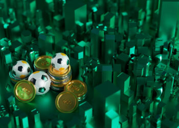 A digital artwork showing stacks of gold coins and soccer balls on a green, abstract cityscape background. The scene suggests a connection between sports and finance or economic themes. | FintechZoom