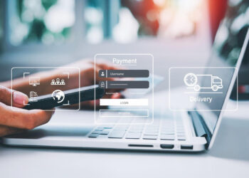 A person uses a smartphone and laptop, illustrating online activities. Floating graphics show "Payment" and "Delivery" icons, with login fields, symbolizing digital transactions and logistics. The concept of payment gateways is seamlessly integrated, as explained by FintechZoom.com. A bright background adds a modern feel. | FintechZoom