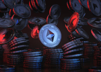 Floating and stacked Ethereum coins shimmer under red and blue lighting, evoking the intricate world of Ethereum mining, all set against a dark background. | FintechZoom