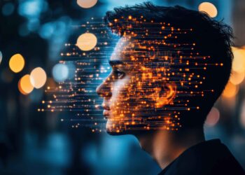 A person in profile view with a DeepSeek digital grid overlay, featuring glowing orange dots and lines, symbolizes a connection between technology and the human mind. The blurred background is adorned with warm, circular bokeh lights. | FintechZoom
